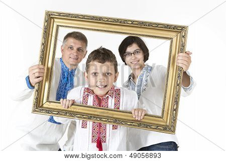 Family portrait in picture frame isolated on white
