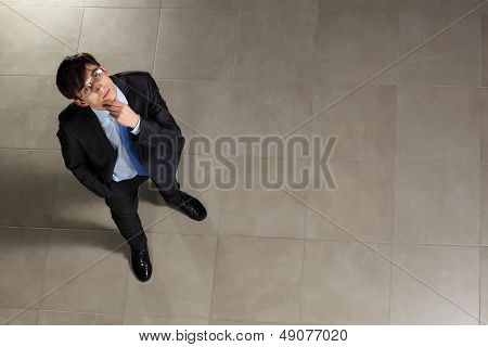 Young businessman in glasses