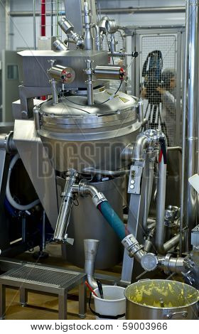 JUVASKULA, FINLAND - DECEMBER 18: Valio factory. Cheese production on February 14, 2013 in Jyvaskyla, Finland. Valio is one of biggest companies in Finland, produces dairy products