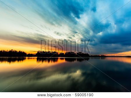Amazing sunset sky reflection in the river