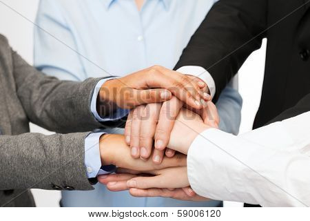business, succcess and winning concept - group of businesspeople celebrating victory