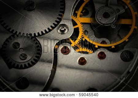 Clockwork details, pinions and wheels closeup