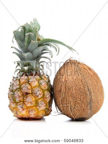 Ripe pineapple and cocoanut on white background