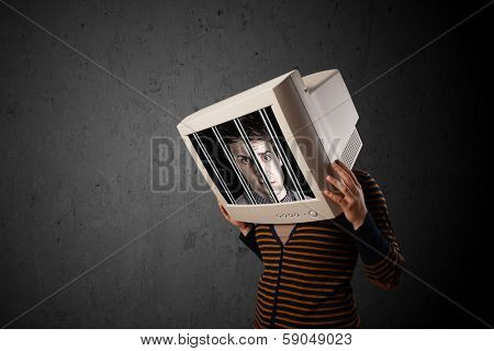 Business man with monitor screen on his head traped into a digital system concept