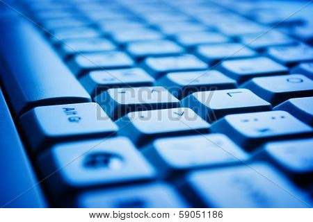 Computer Keyboard In Blue Light