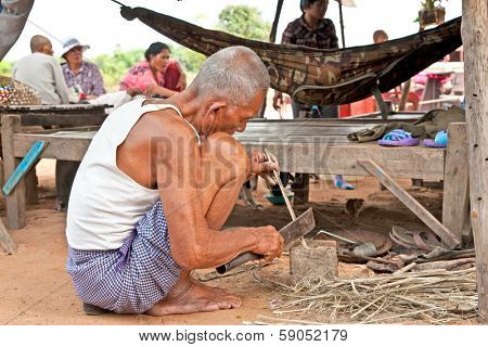 SIEM REAP, CAMBODIA-NOV 22, 2013: Cambodian people live beside Tonle Sap Lake in Siem Reap, Cambodia on Nov 22, 2013. Tonle Sap is the largest freshwater lake in SE Asia peaking at 16k km2