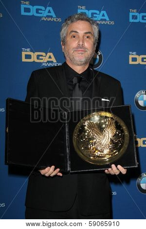 LOS ANGELES - JAN 25:  Alfonso Cuaron at the 66th Annual Directors Guild of America Awards - Press Room at Century Plaza Hotel on January 25, 2014 in Century City, CA