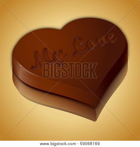 Sweet Chocolate heart on a golden mirror