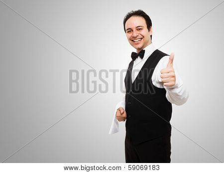 Portrait of an happy smiling waiter