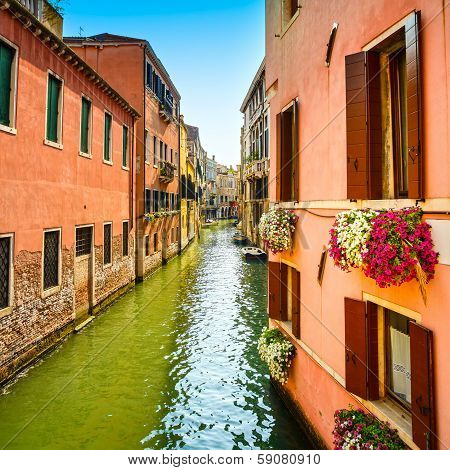 Venice Cityscape, Cannaregio Water Canal, Flowers And Boats. Italy