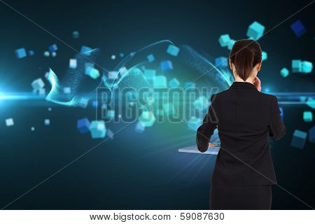 Thoughtful businesswoman pointing against futuristic screen with quaders