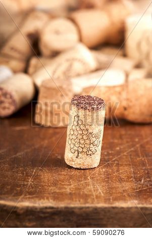 bottle corks on the wooden background