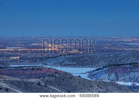 night view of Fort Collins in Colorado with foothills and Horsetooth Reservoir, winter scenery