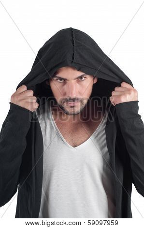 Portrait of a young angry man in the hood
