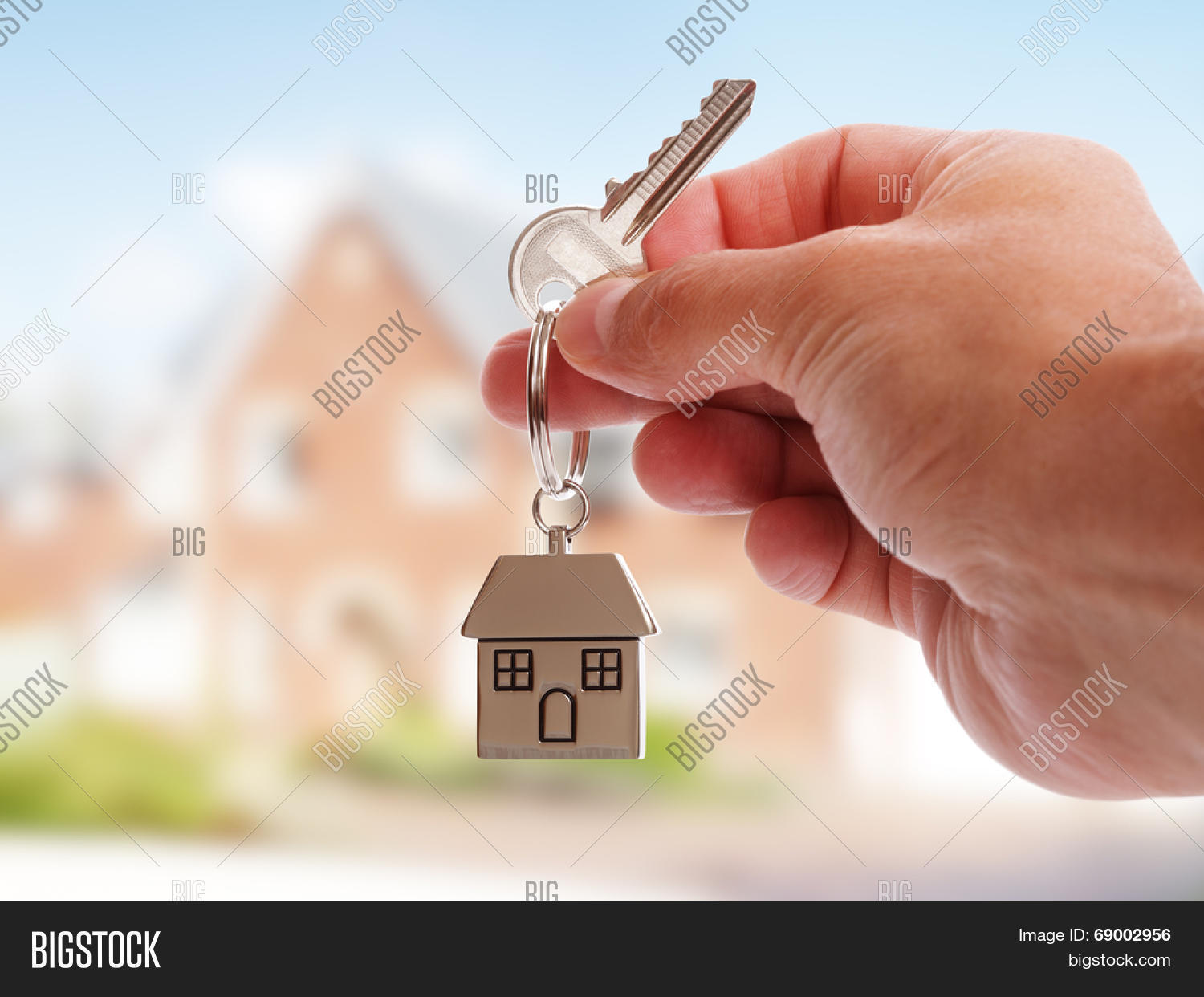 Holding House Keys On Image & Photo (Free Trial) Bigstock