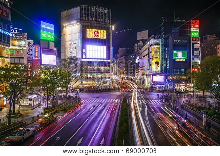 TOKYO, JAPAN - MARCH 30, 2014: Shibuya Ward at Shibuya crossing is one of Tokyo's major nightlife and fashion centers.