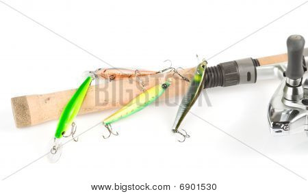 Plastic Fishing Lures On Cork Rod Handle
