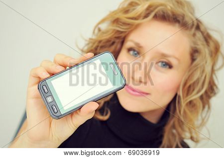 Businesswoman Showing Mobile Phone