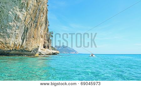 Boat By The Cliff