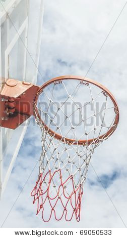 Red Basketball Hoop And White Cloud
