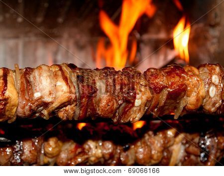 Spit Roast With Meat Cooked On A Spit In The Fireplace 1