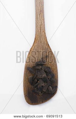 Sunflower Seeds With Wooden Spoon