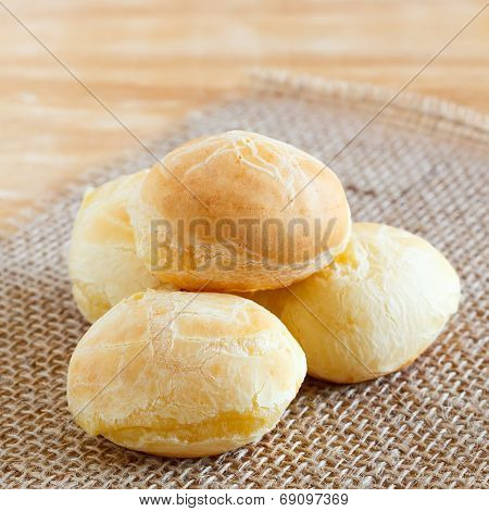 Cheese Bread (pao De Queijo) Brazilian Snack On Sackcloth On Wooden Table