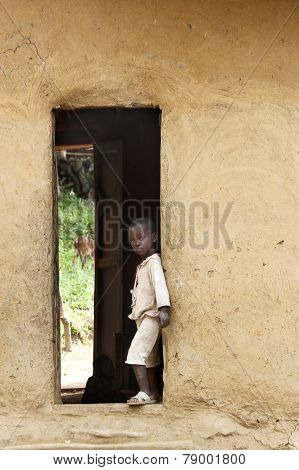 Boy In A Doorway