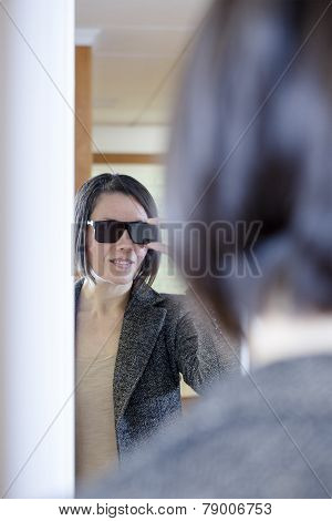 Trying On Sunglasses