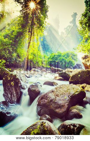 Vintage retro effect filtered hipster style image of tropical waterfall Phnom Kulen, Cambodia