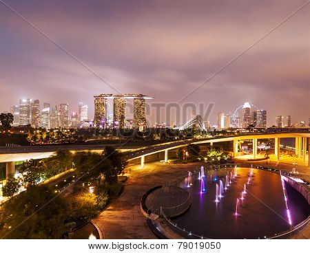 Tracel background of Singapore skyline illumintaed in the evening twilight