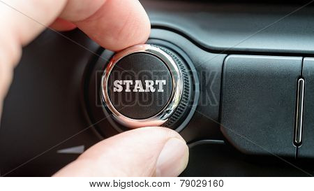 Man Turning A Dial With The Word Start