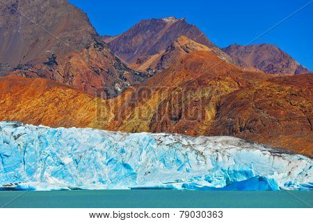 Unique lake Viedma in Argentine Patagonia. The lake is surrounded by mountains. Excursion by boat to the huge white-blue glacier