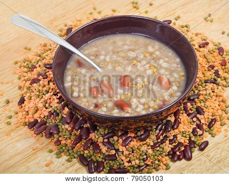 Mess Of Pottage In Bowl With Tablespoon On Plate