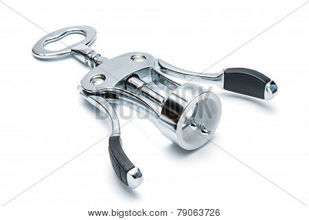 The metal chrome lever-type corkscrew isolated on white.