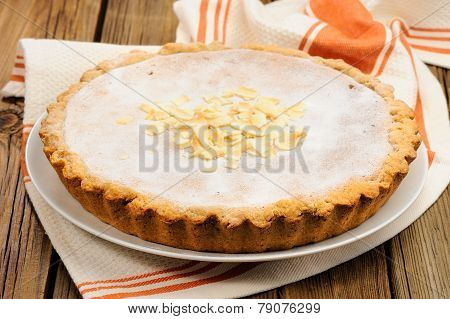Round Banana Tart On Wooden Background