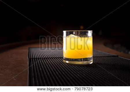 Screw Driver Cocktail On A Bar Ribber Mat