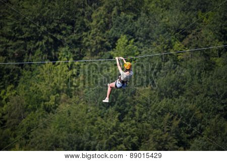 Adult woman on zip line