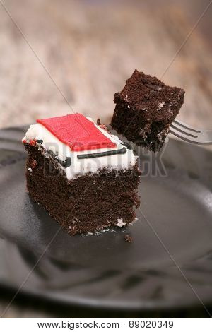 Piece of chocolate cake close-up