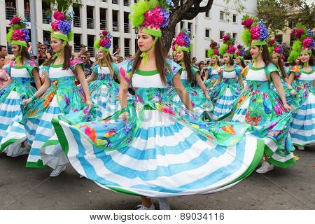 FUNCHAL MADEIRA - APRIL 20 2015: Young girls dancing in the Madeira Flower Festival Funchal Portugal