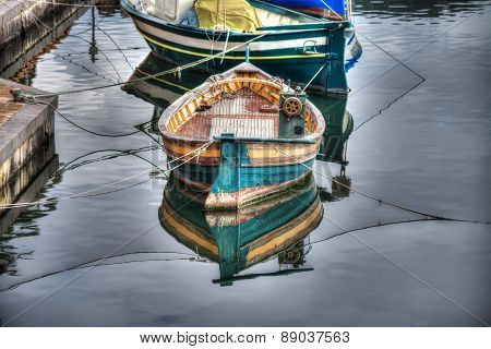 Small Wooden Boat Moored In Temo River