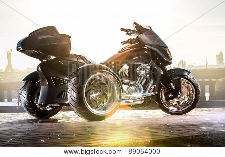 Black trike standing on the light street