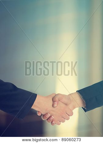 Architectural Handshaking In Front Of Building