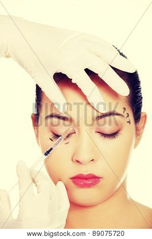 Cosmetic botox injection in the female face