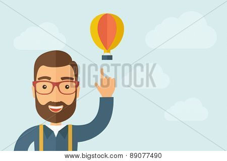 A Man pointing the hot mair balloon icon. A contemporary style with pastel palette, light blue cloudy sky background. Vector flat design illustration. Horizontal layout with text space on right part.