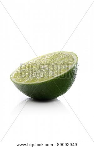 Halved lime on white background