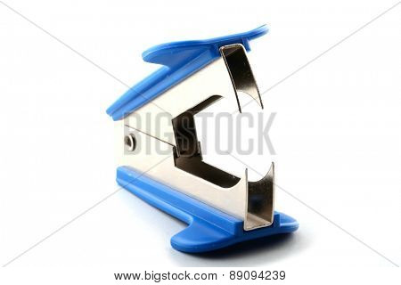 Staple remover on white background