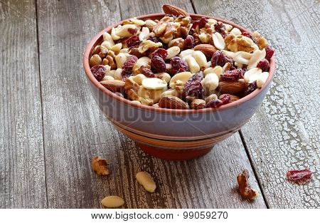 Mix Of Dried Fruits And Nuts In A Ceramic Bowl