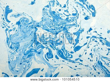 Abstract Blue And White Swirl Background Made From A Can Of Paint.