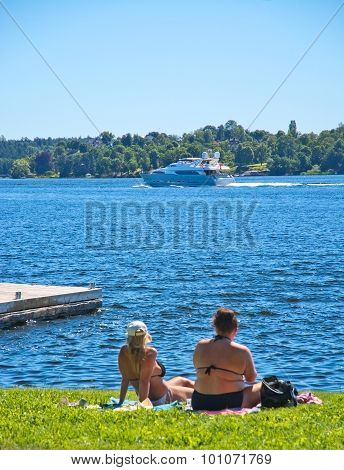 Two Sunbathing Ladies